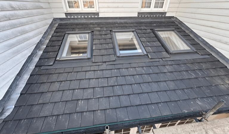 Slate roof with three new roof windows fitted and flashed
