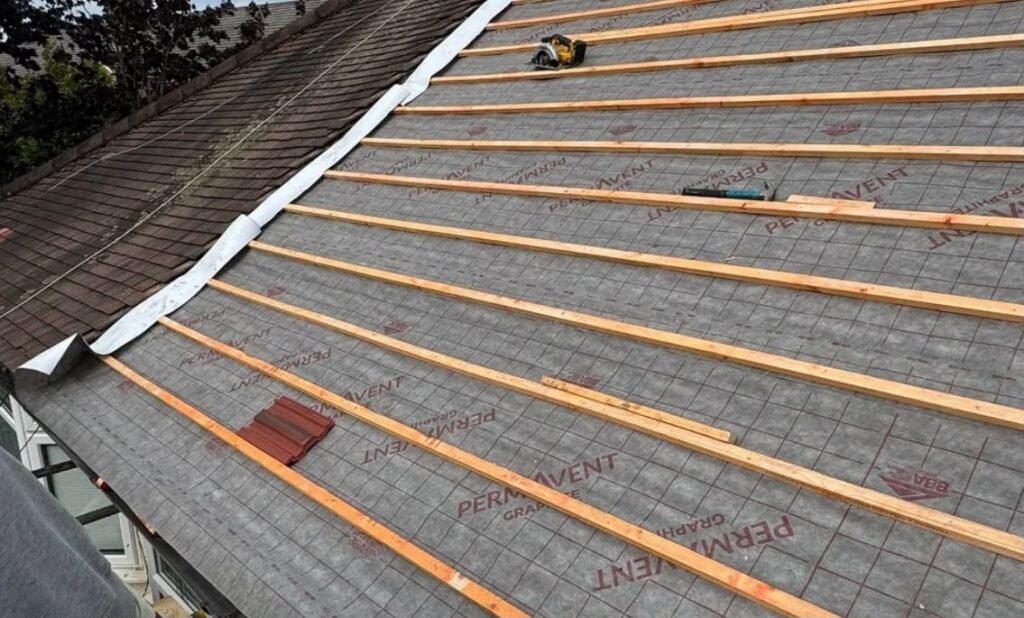 Re-roof in progress with new breathable membrane and timber battens