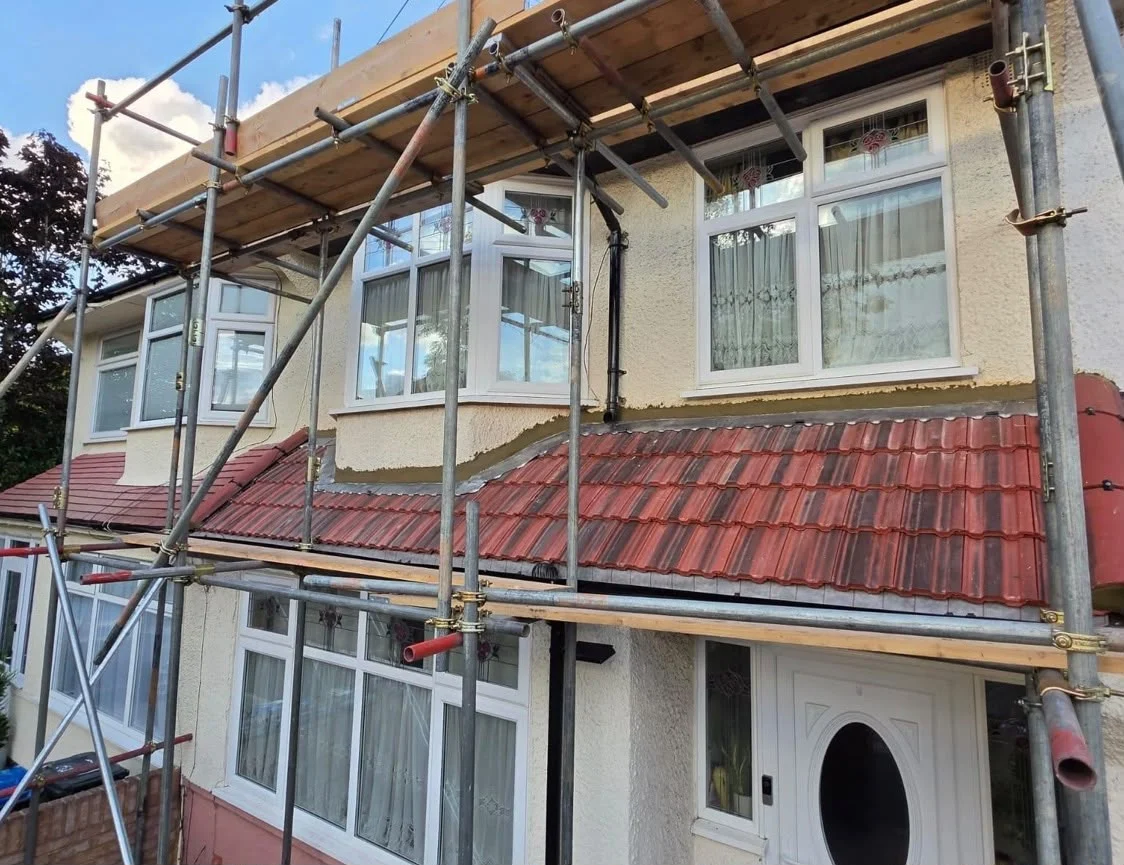 Scaffolding up for roofing work on a bay roof
